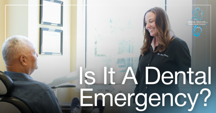 Is it a Dental Emergency? Doctor smiling at patient in chair